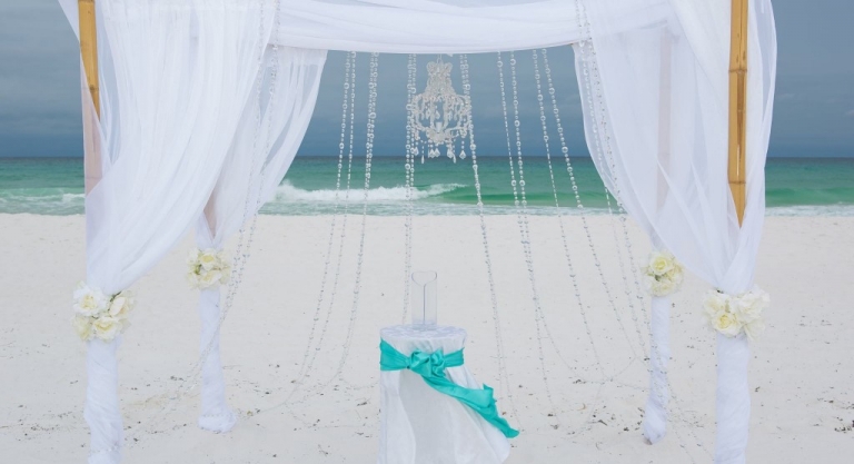 bamboo arbor with crystals by Princess Wedding Co Destin