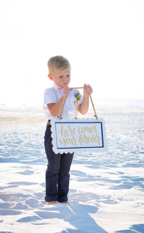 sign carrier outfit beach wedding